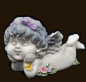 Preview: OLGA liegend mit Blumen (Figur 2) Höhe: 8 cm