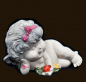 Preview: OLGA liegend mit Blumen (Figur 3) Höhe: 8 cm