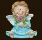 Preview: Engel sitzend mit Blumenstrauss Höhe: 5,5 cm