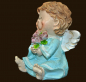 Preview: Engel sitzend mit Blumenstrauss Höhe: 5,5 cm