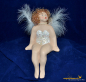 Preview: Engelfrau sitzend weiss und gold (Figur 1) Höhe: 22 cm