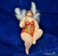Preview: Engel sitzend molly mit Kopfbedeckung rot Höhe: 16 cm