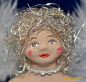 Preview: Engelfrau sitzend silber Glitter Höhe: 16 cm