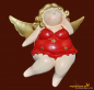 Preview: Engel-Frau auf Kante sitzend rot (Figur 1) Höhe: 12 cm