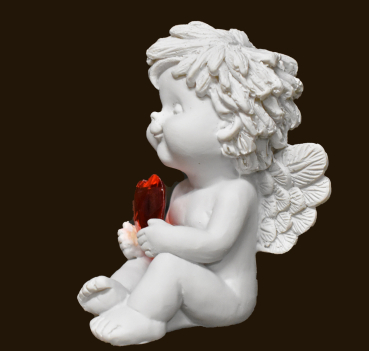 IGOR sitzend mit Kristallherz (Figur 2) Höhe: 9,5 cm