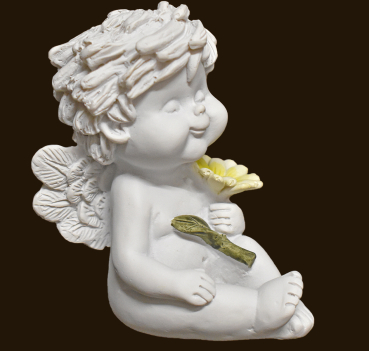 IGOR sitzend mit Blume Höhe: 9 cm