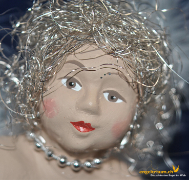 Engelfrau sitzend silber (Figur 2) Höhe: 22 cm