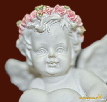 Engel liegend mit Herz und Blütenkranz (Figur 2) Höhe: 5 cm
