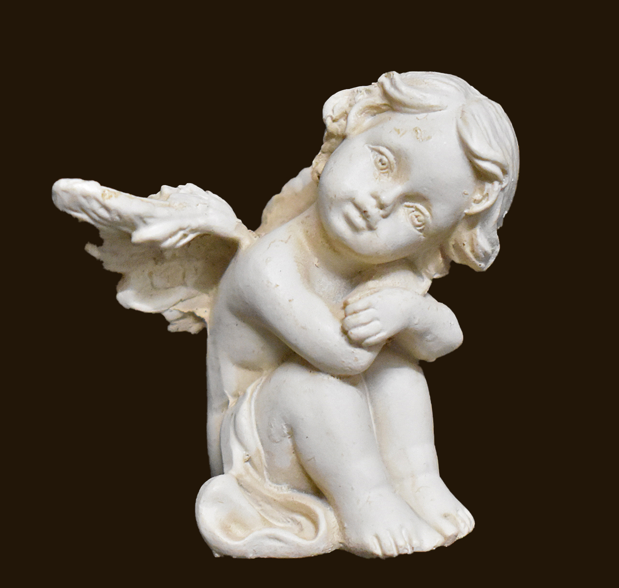 Sitzendes Engelchen antikweiss (Figur 1) Höhe: 6 cm