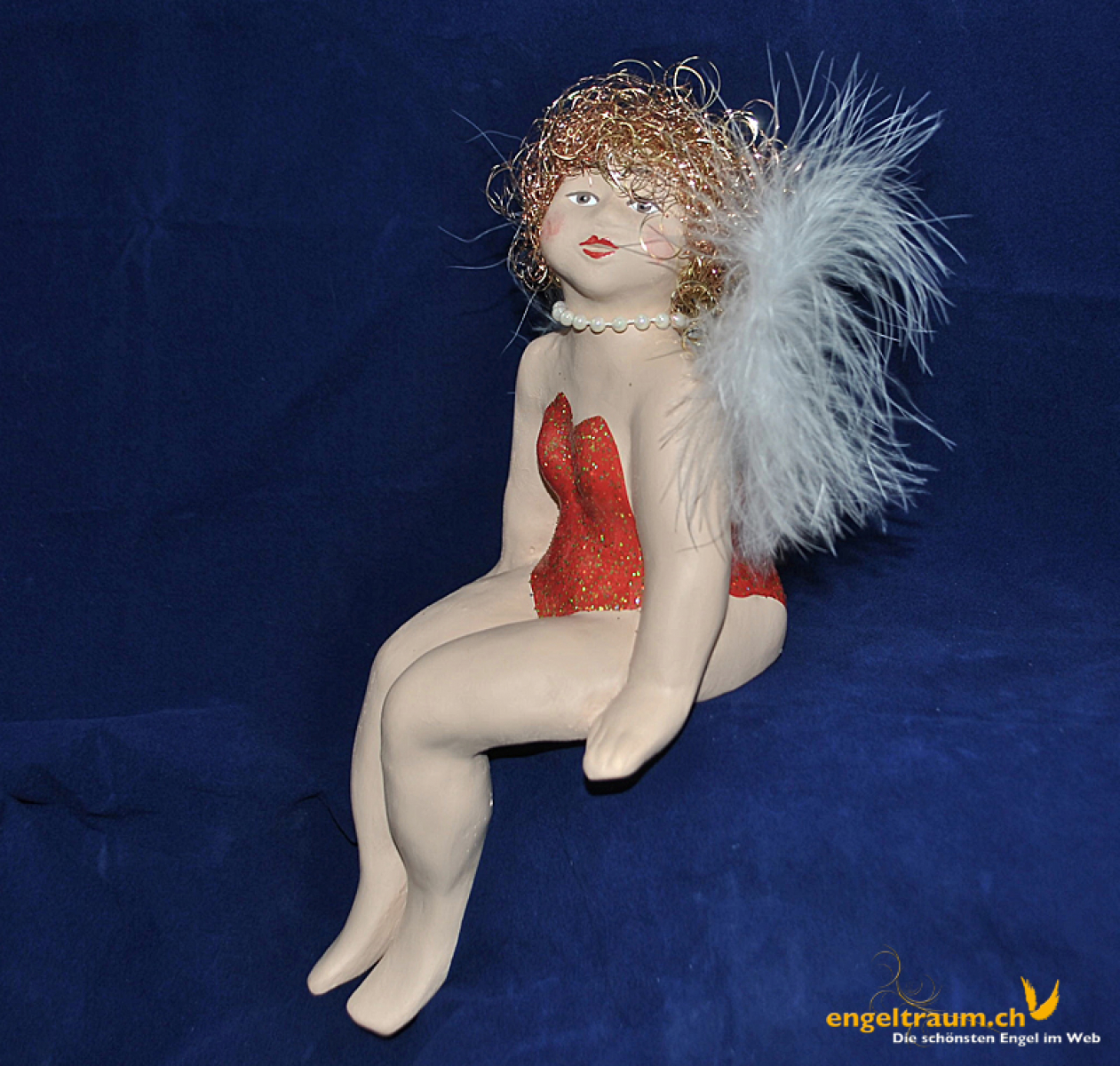 Engelfrau sitzend rot (Figur 1) Höhe: 22 cm