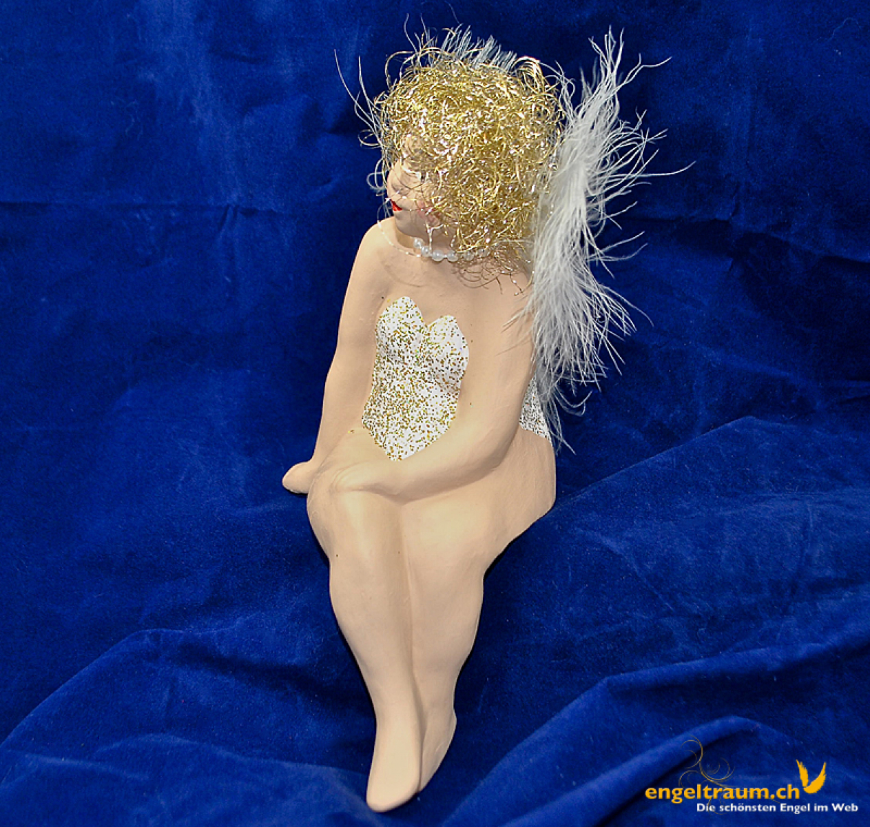 Engelfrau sitzend weiss und gold (Figur 4) Höhe: 22 cm