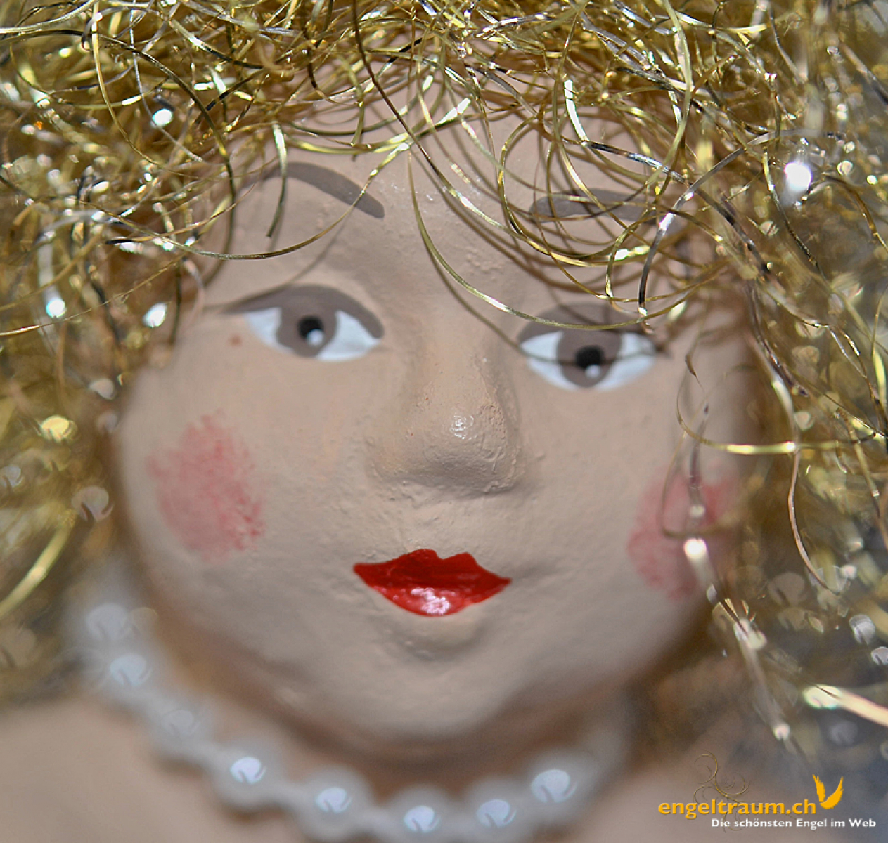 Engelfrau sitzend weiss und gold (Figur 4) Höhe: 22 cm