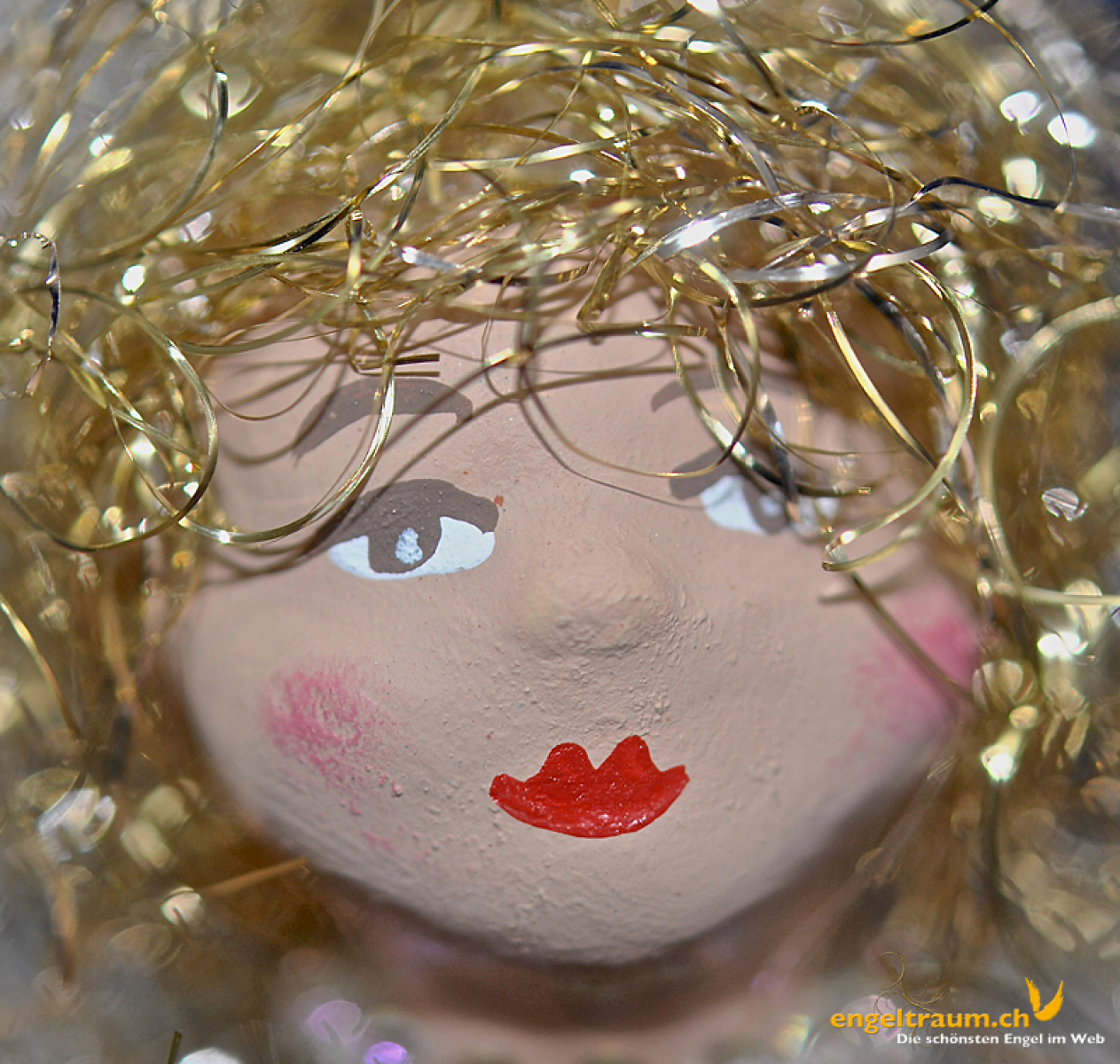 Engelfrau sitzend hellgrün Glitter Höhe: 16 cm