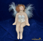 Engelfrau sitzend weiss und gold (Figur 1) Höhe: 22 cm